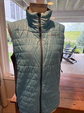 Norrona brand Norwegian  light blueQuilted Insulated Vest with Gray Side Panels